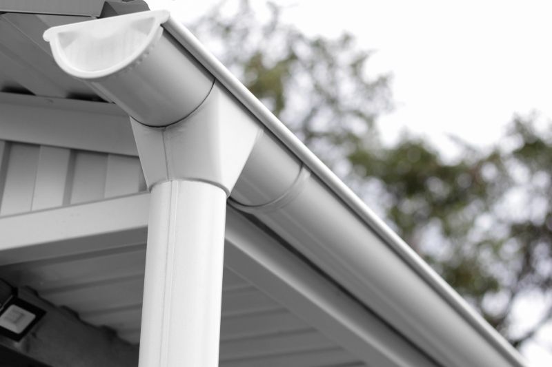 Gutter system with protective guards